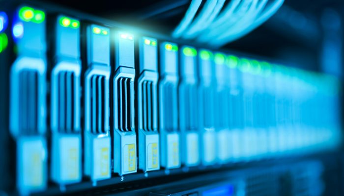 pexels-photo-1148820-1148820 Detailed image of a server rack with glowing lights in a modern data center.